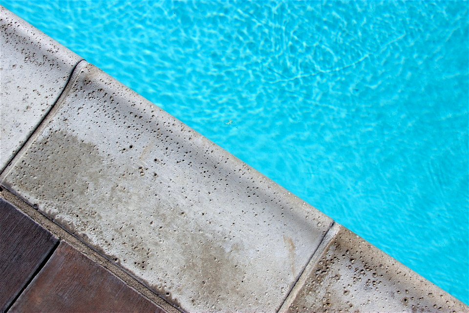 Concrete Edge Near Pool Water