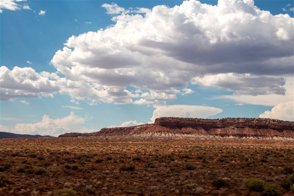 Big White Cloud Above Mountains In Desert