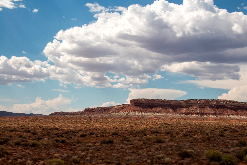 Big White Cloud Above Mountains In Desert photo