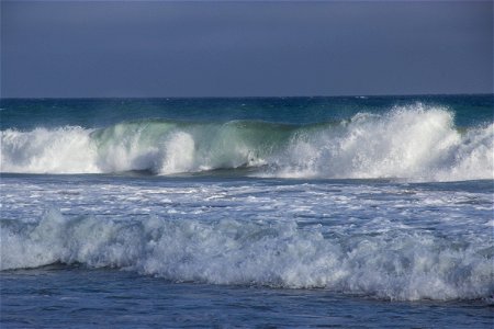 Drizzling Big Waves Near Shore photo