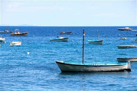 Several Small Boats On Water photo