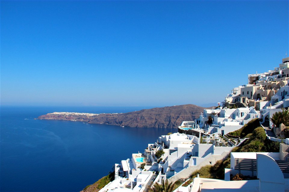 White Cliff Buildings In Santorini Island photo