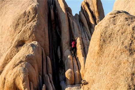 Man Climbing Big Rock photo