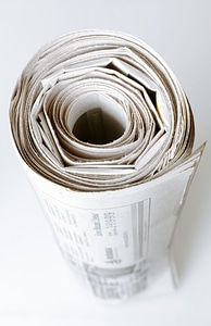 Rolled up newspaper photo