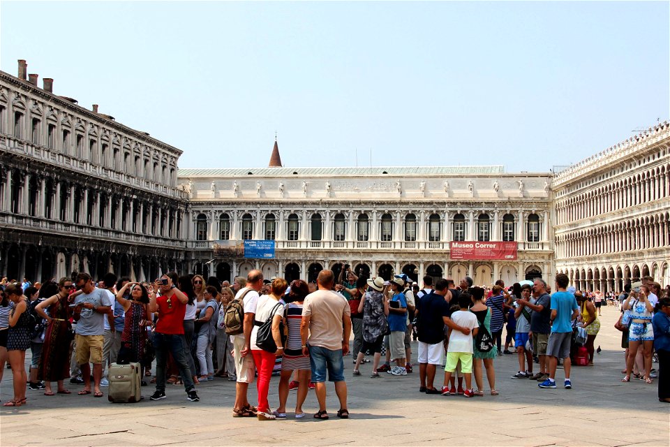 Groups Of Tourists In St Mark Square In Venice photo