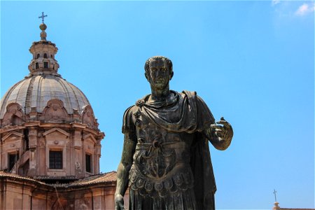 Bronze Statue Of Caesar In Front Of Church