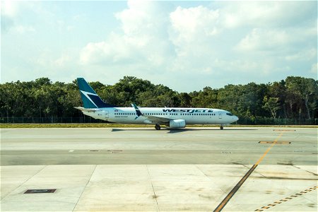 Commercial Plane On Runway photo