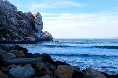 Rocky Cliff On Water photo