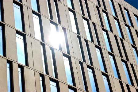 Sun Reflecting On Building Windows photo
