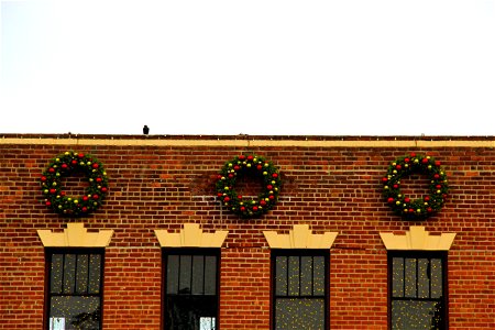 Wreaths Decorations On Building Facade photo