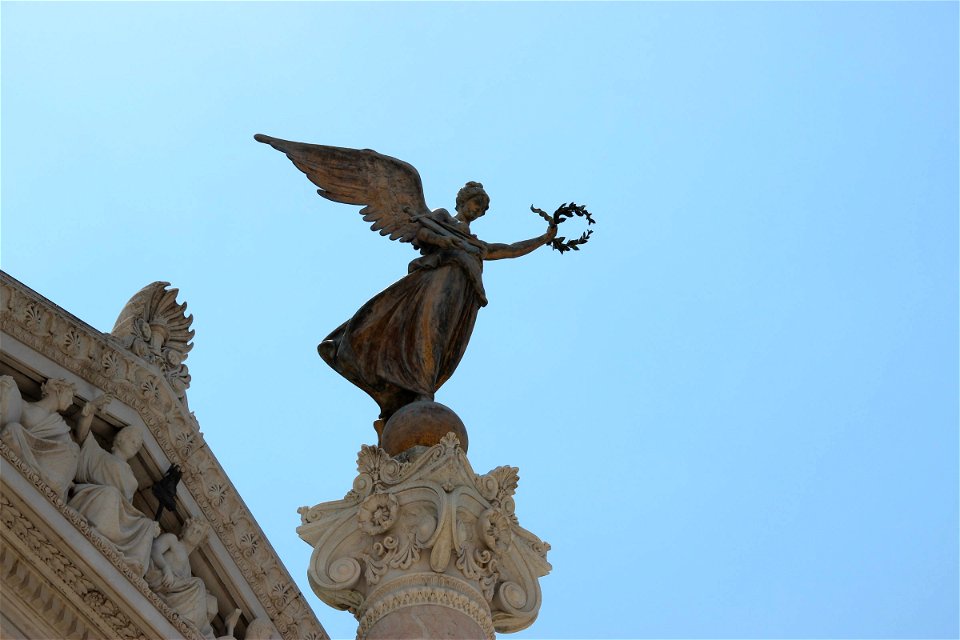 Bronze Winged Statue In Italy