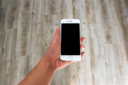 Hand Holding iPhone