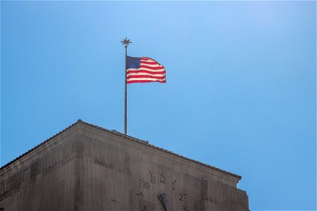 American Flag On Clock Building photo
