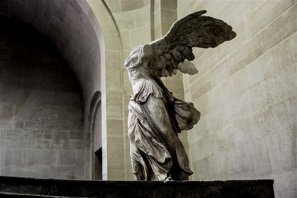 Headless Winged Statue In Museum photo