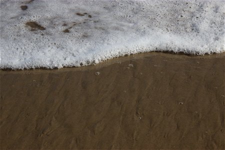 Waves Foam On Shore photo