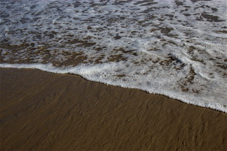 Shoreline On Beach Sand photo