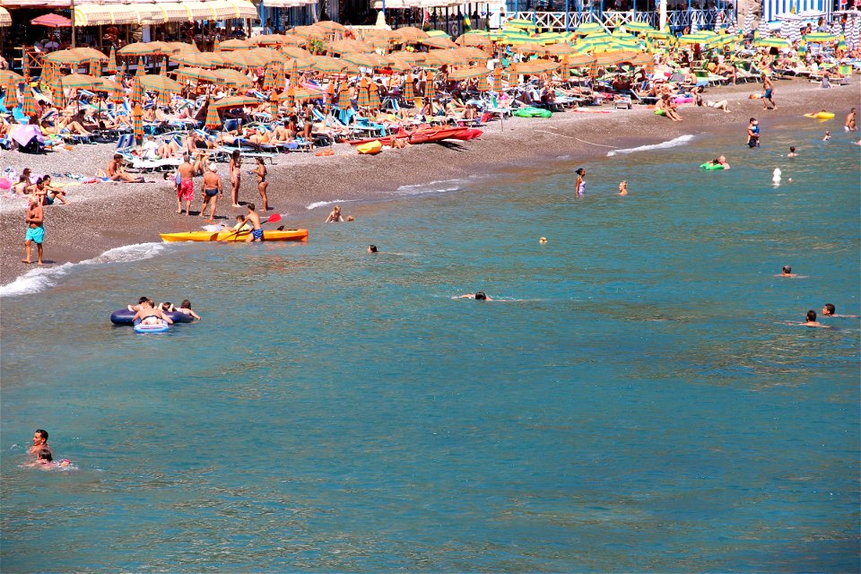 Beach Crowded with Umbrellas