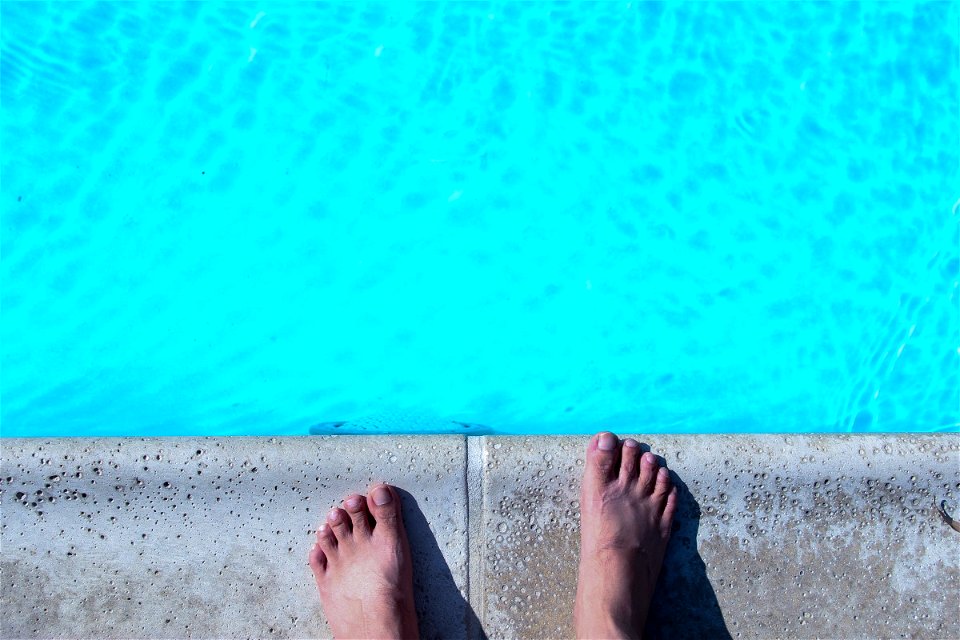 Feet at Edge of Pool photo