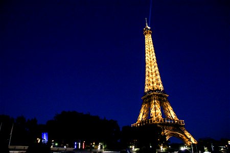 Eiffel Tower Lit Up at Night photo