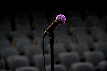 Microphone on Stand and Empty Seats photo