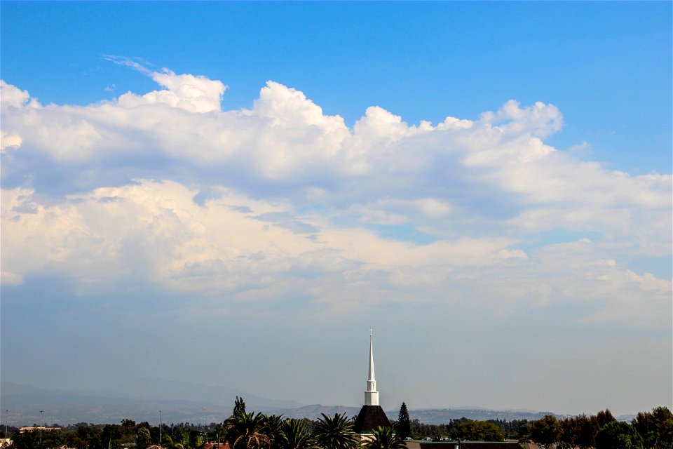 Church Steeple Under Clouds in Sky photo
