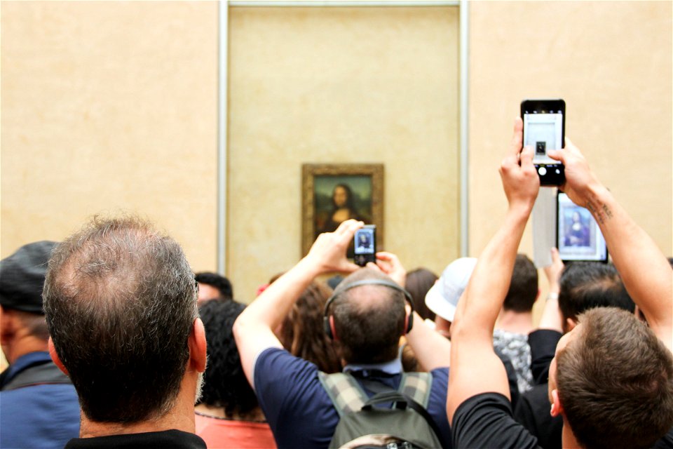 Tourists Taking Pictures of Mona Lisa