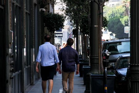 Men Walking on Street photo