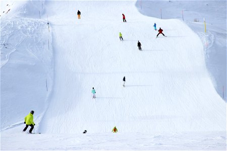 Skiers on Snow Run photo