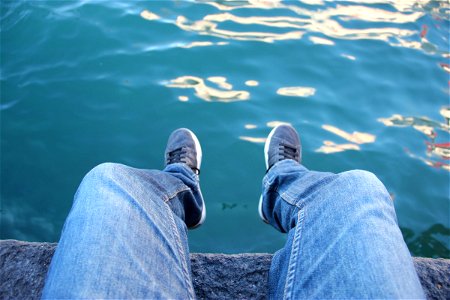Sitting with Feet Over Water photo