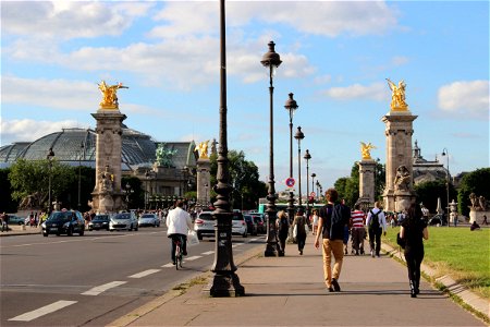 People Walking Down Paris Street photo