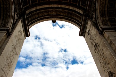 Building Archway Under Clouds photo