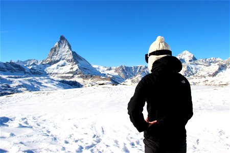 Woman Looking at Mountain Peak photo