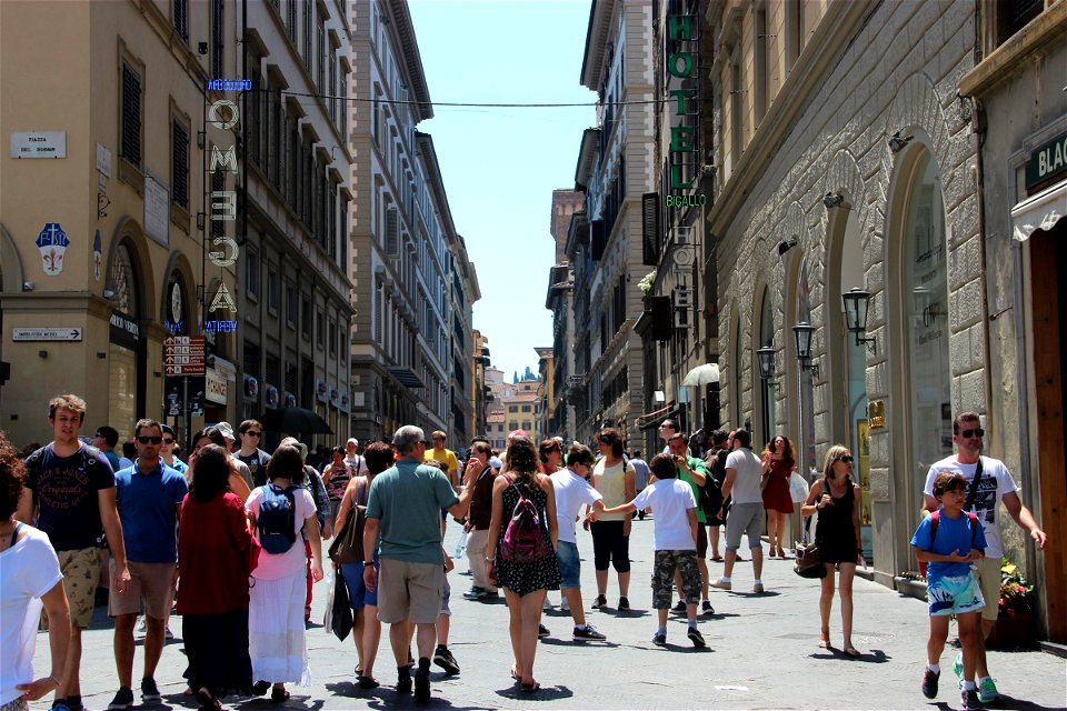 Crowds of People Walking on Street photo