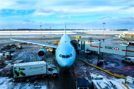 Airplane at Snowy Airport Terminal