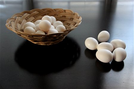 Eggs in Basket & On Table photo