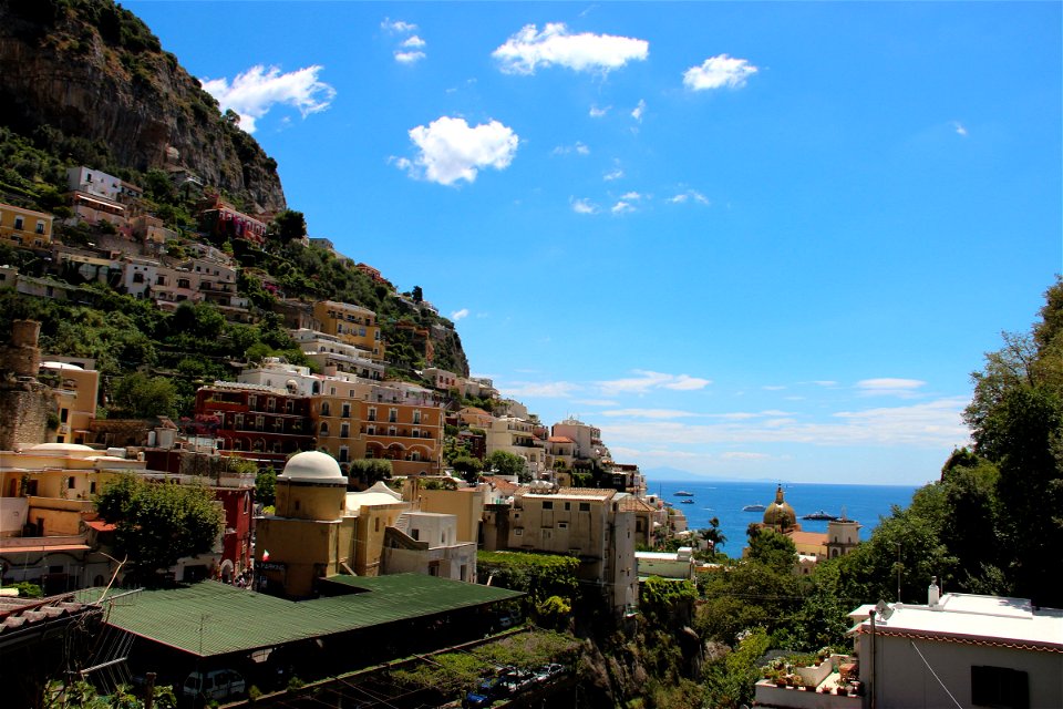 Buildings on Hillside by Ocean