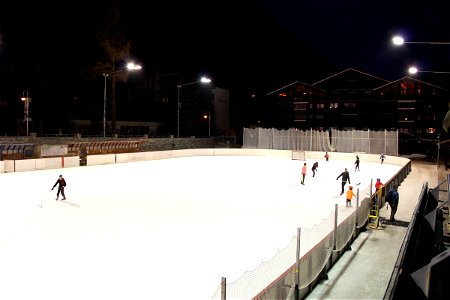 Kids Playing Hockey at Night photo