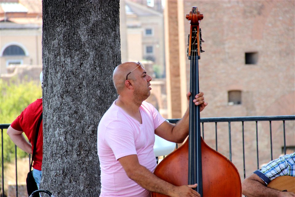 Man Playing Cello in Street
