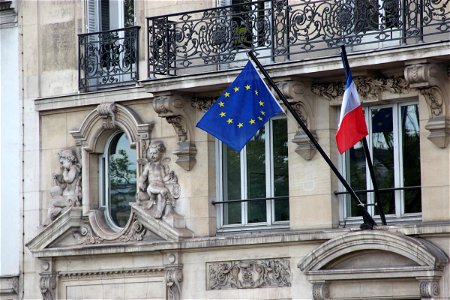 European Union & French Flag on Building photo