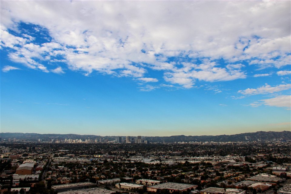 City Under Blue Sky with Clouds