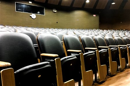 Rows of Chairs in Auditorium photo