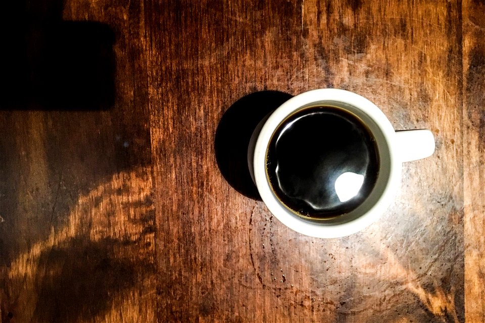 White Cup of Coffee on Wood Table