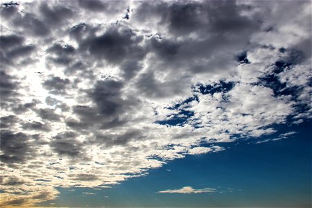 Scattered Clouds Covering the Sun photo