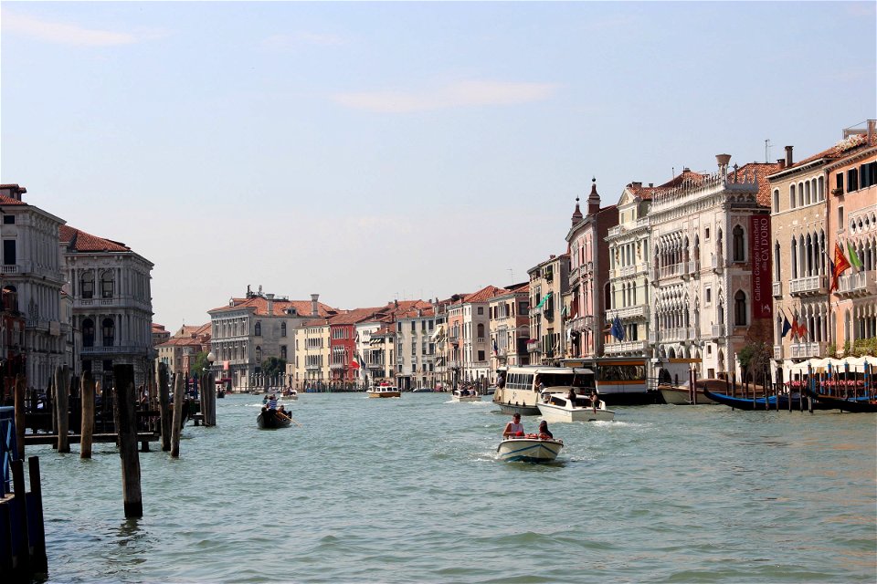 Boats on Venice Canals with Buildings photo