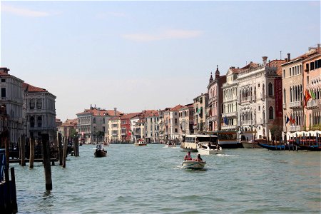 Boats on Venice Canals with Buildings photo