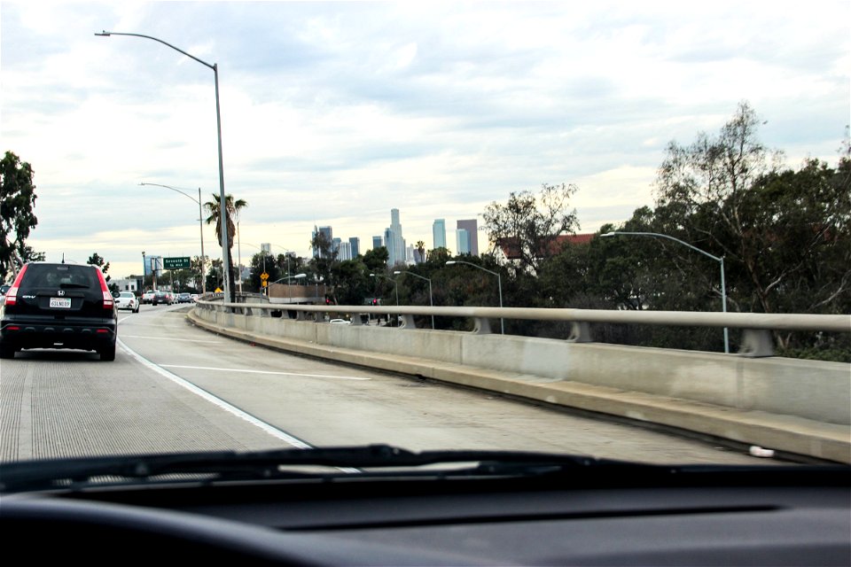 Freeway to Downtown City Through Windshield photo