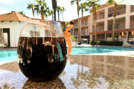 Drink in Wine Glass by Pool