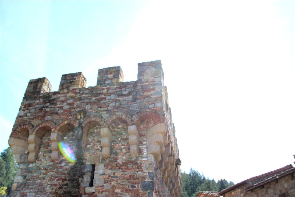 Stone Castle Tower Under Sun photo
