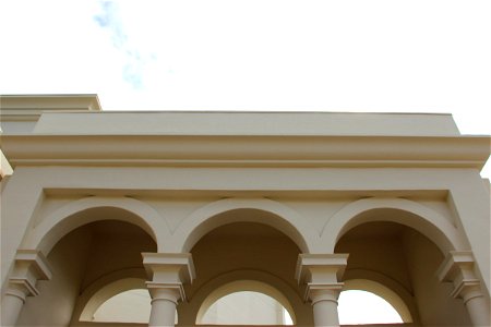 Columns and Arches on White Building