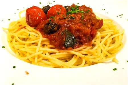 Tomatoes & Sauce on Spaghetti Plate photo